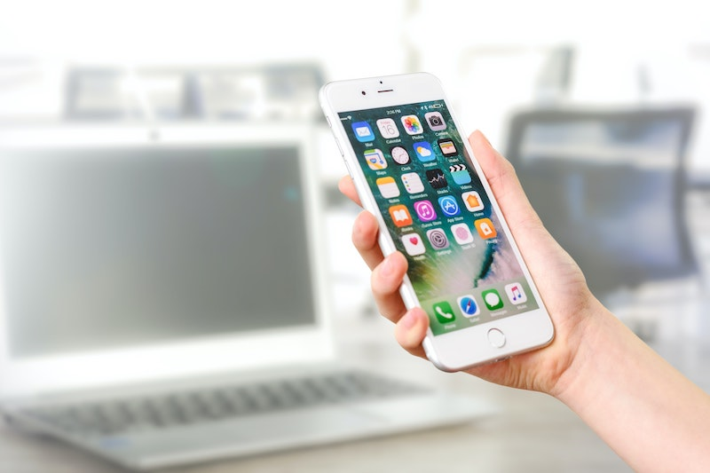 A woman using her mobile device