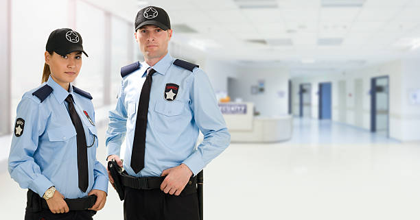 Two security guard in office.